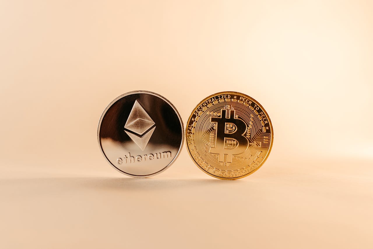 Ethereum and Bitcoin coins symbolizing leading cryptocurrencies for long-term investment.