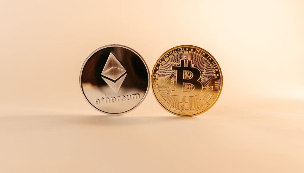 Ethereum and Bitcoin coins symbolizing leading cryptocurrencies for long-term investment.